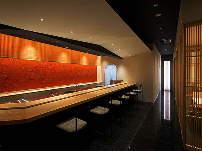 Washi back wall at a sushi counter